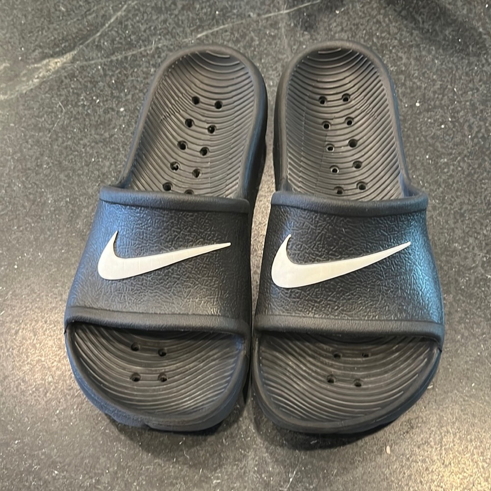 Nike foam sandals slides.